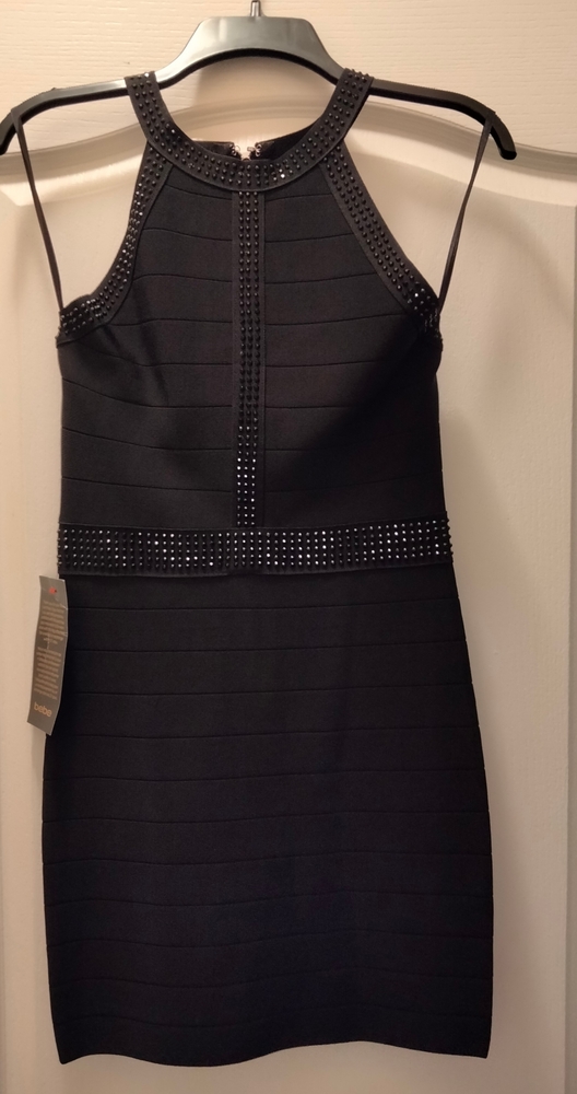 Beautiful black studded Bebe mini dress